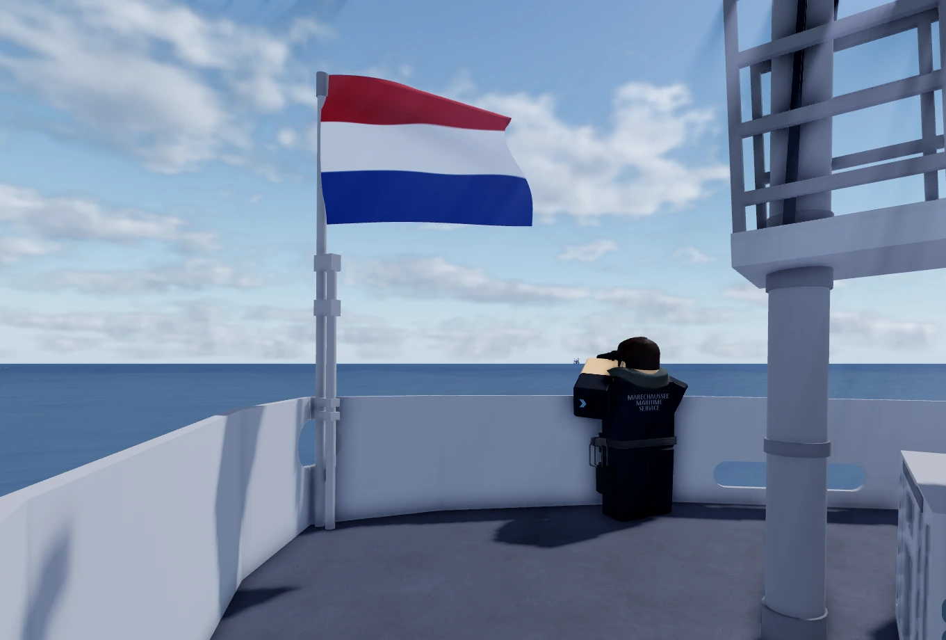 Koninklijke Marechaussee officer saluting the Dutch flag at sea